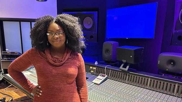 Montgomery County Community College alumna Blessing Osazuwa, ’20, stands in the Mix Room on the Blue Bell Campus. The music major transferred to Columbia University in 2020. Photo by Eric Devlin